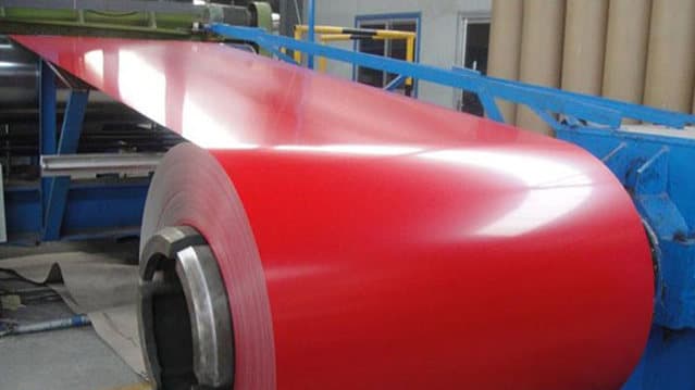 Stack of coloured aluminium flat sheets ready for fabrication