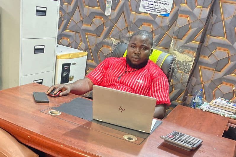 CEO of Gods Promise Aluminium in the factory, representing a business built on promise